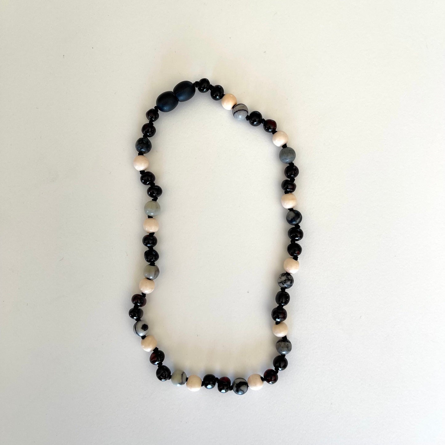Ambre - Cherry Amber with Monochrome Stones